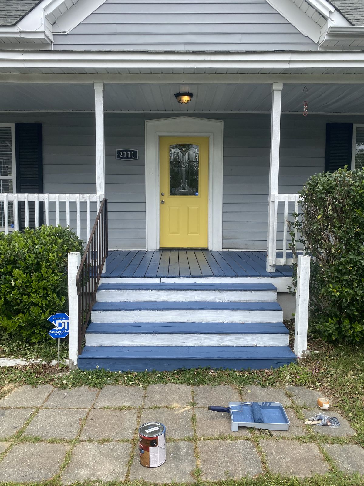 Front porch and exterior refresh with a bright entry door
