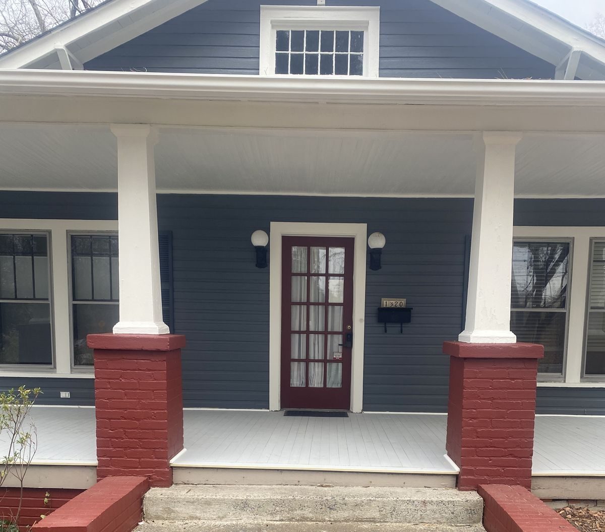 Craftsman front porch with columns and finish carpentry